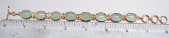 Vergulde zilveren armband met ovale aqua Chalcedoon schakels